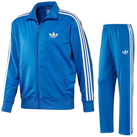 blue and black adidas tracksuit.